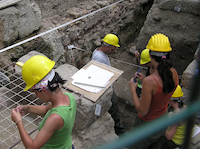 Archaeologists on a dig site