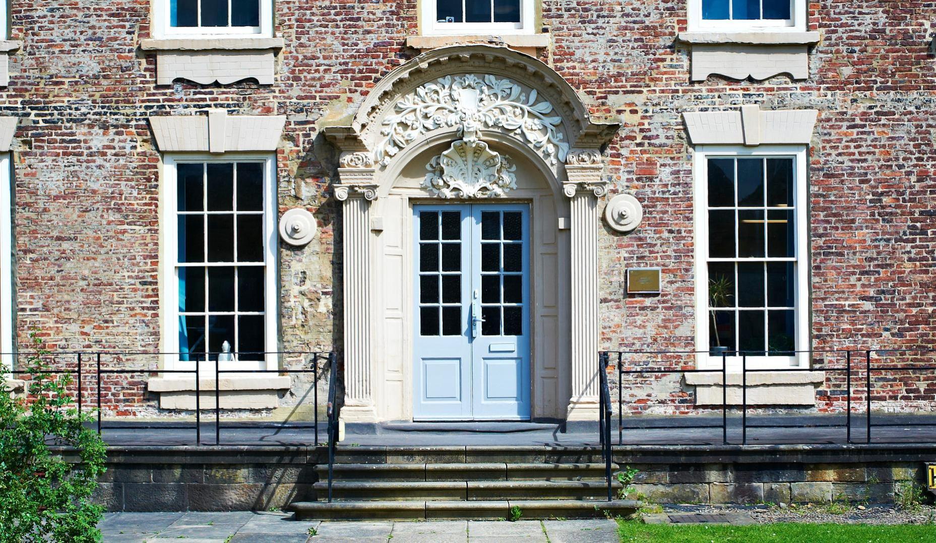 External shot of the front door leading into the institute of advanced study