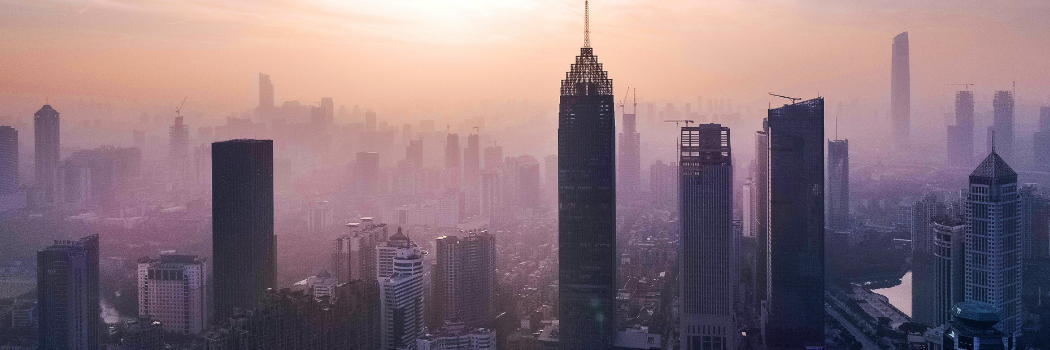 Aerial Photography of City Buildings Under Cloudy Sky