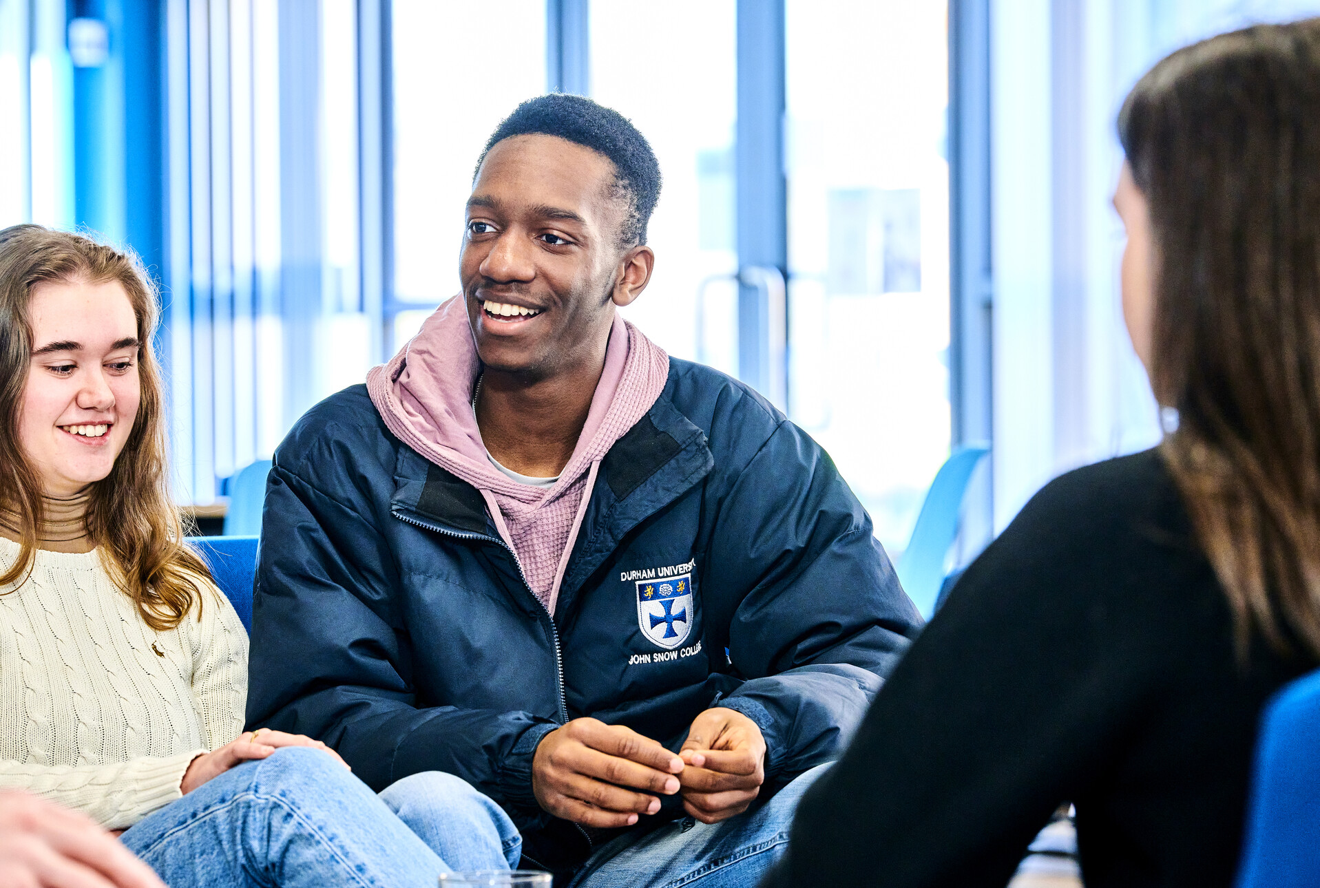 Students chatting around a table