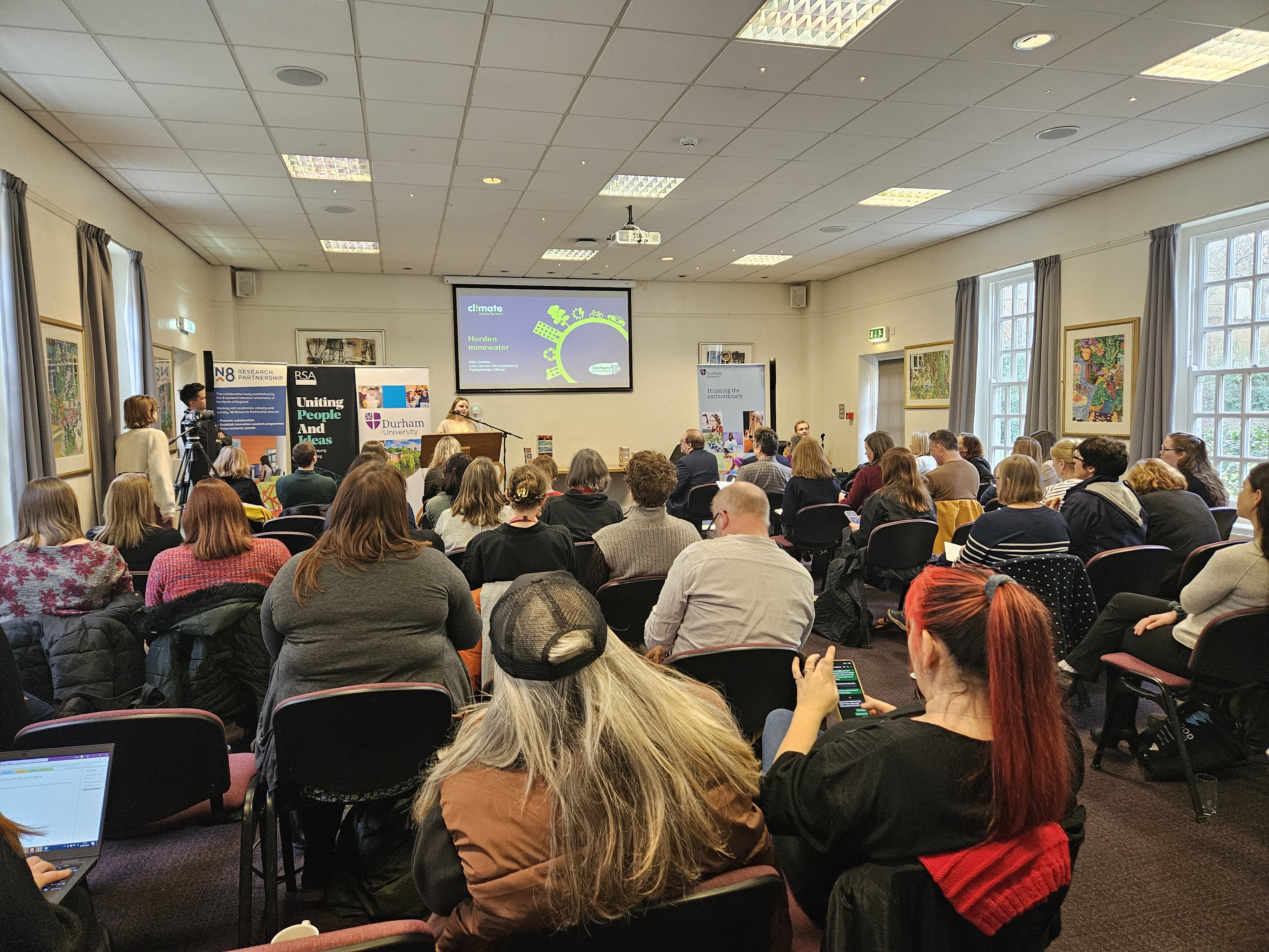 Ellie Grimes speaks to the audience at the UP North Ideas Forum