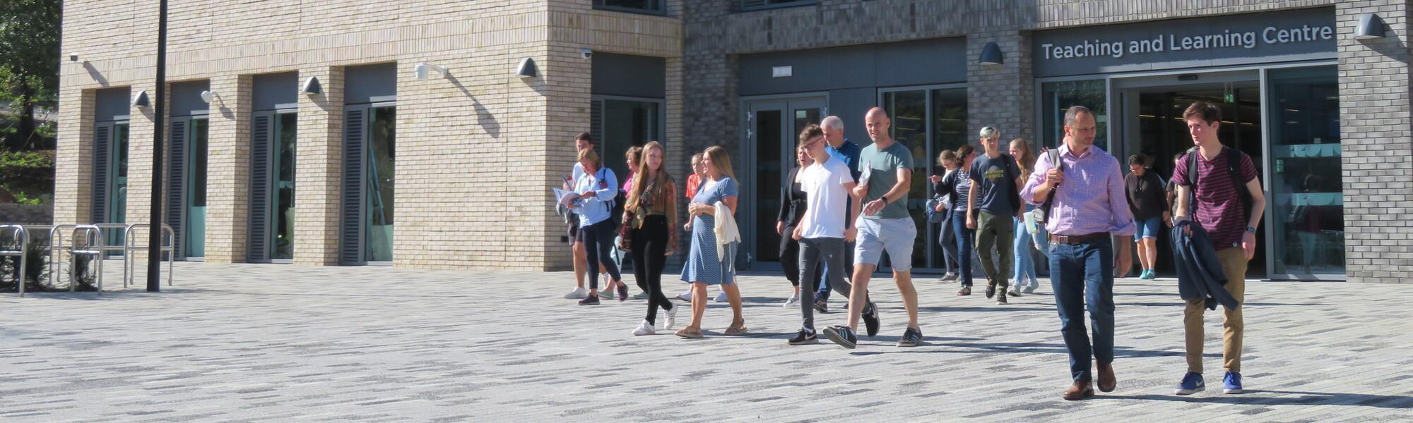 People exiting the teaching and learning centre
