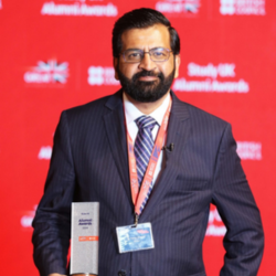 Tanvir Ahmad with his award