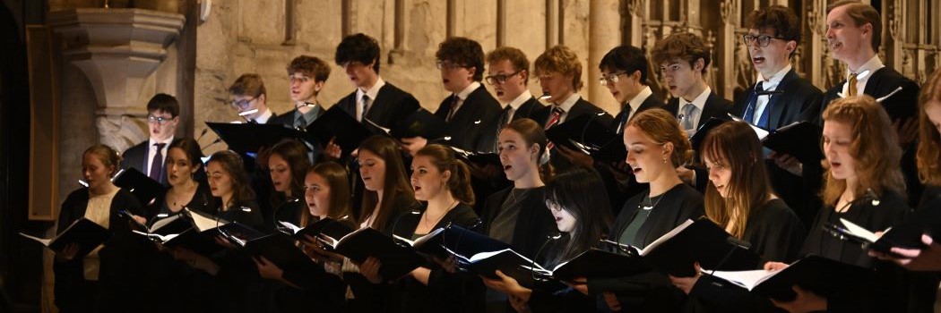 A choir singing in a cathedral
