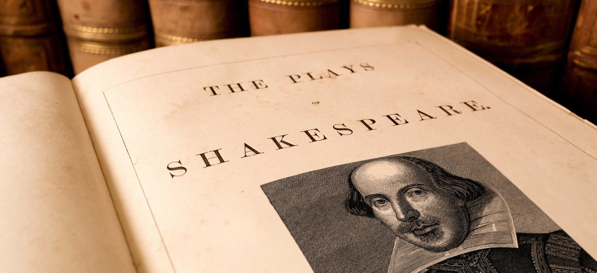 Image showing book of Shakespeare plays open with image of Shakespeare