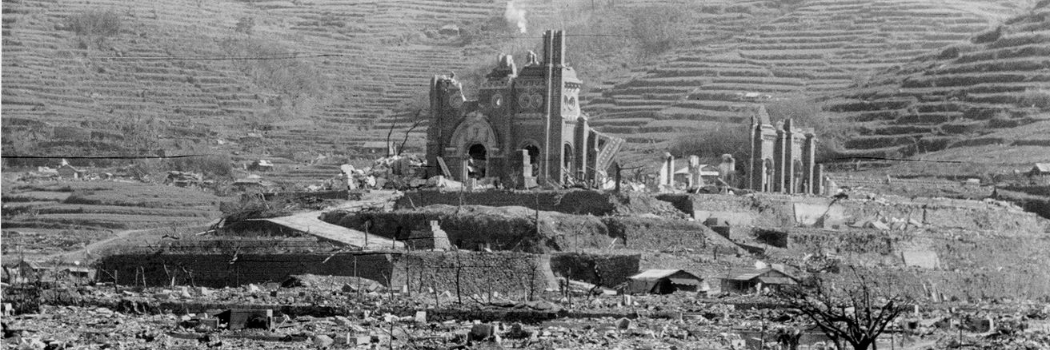 The ruins of a cathedral surrounded by rubble