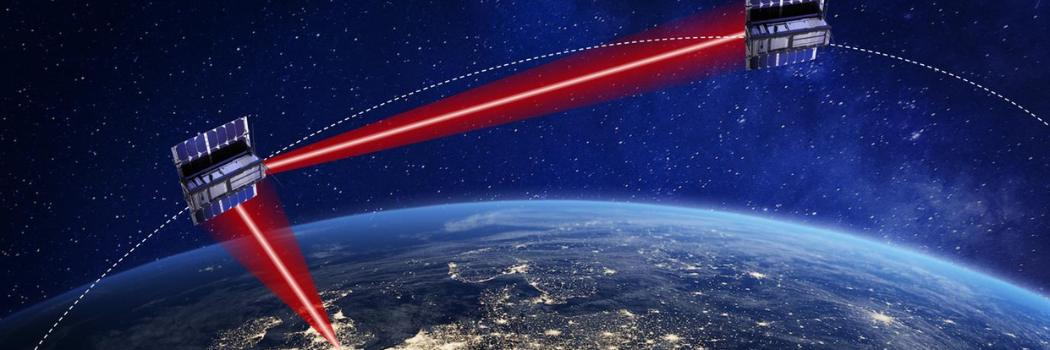Graphic depicting two satellites in space with a red laser bouncing between them and hitting the earth