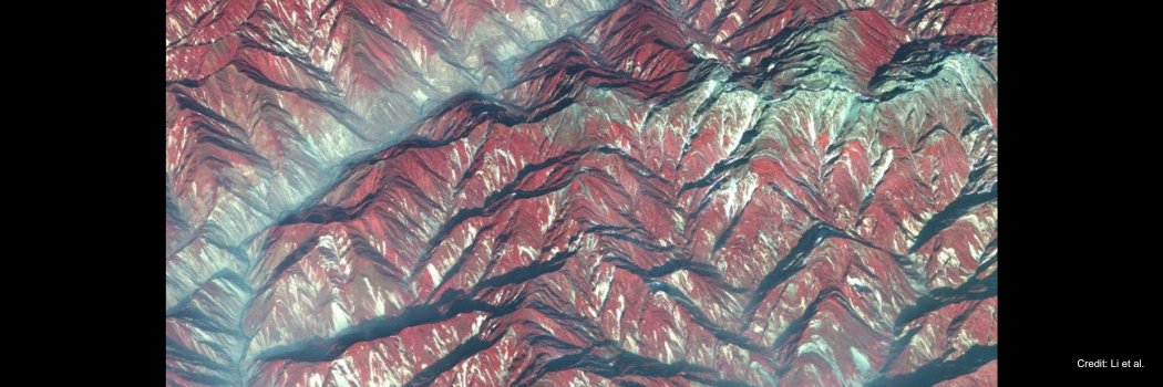 Satellite imagery of the Longmen Mountains reveals the destruction wrought by the Wenchuan Earthquake. There's no snow depicted in this false-color composite image; all of the white patches are landslides.
