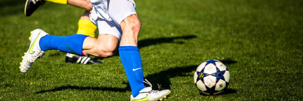 Two players with a football