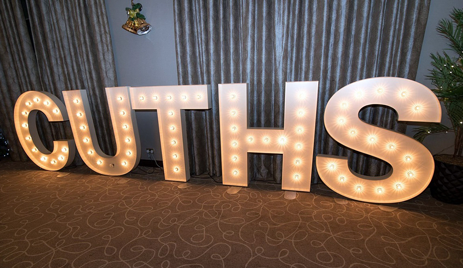 Cuths illuminated Michaelmas Ball Signage