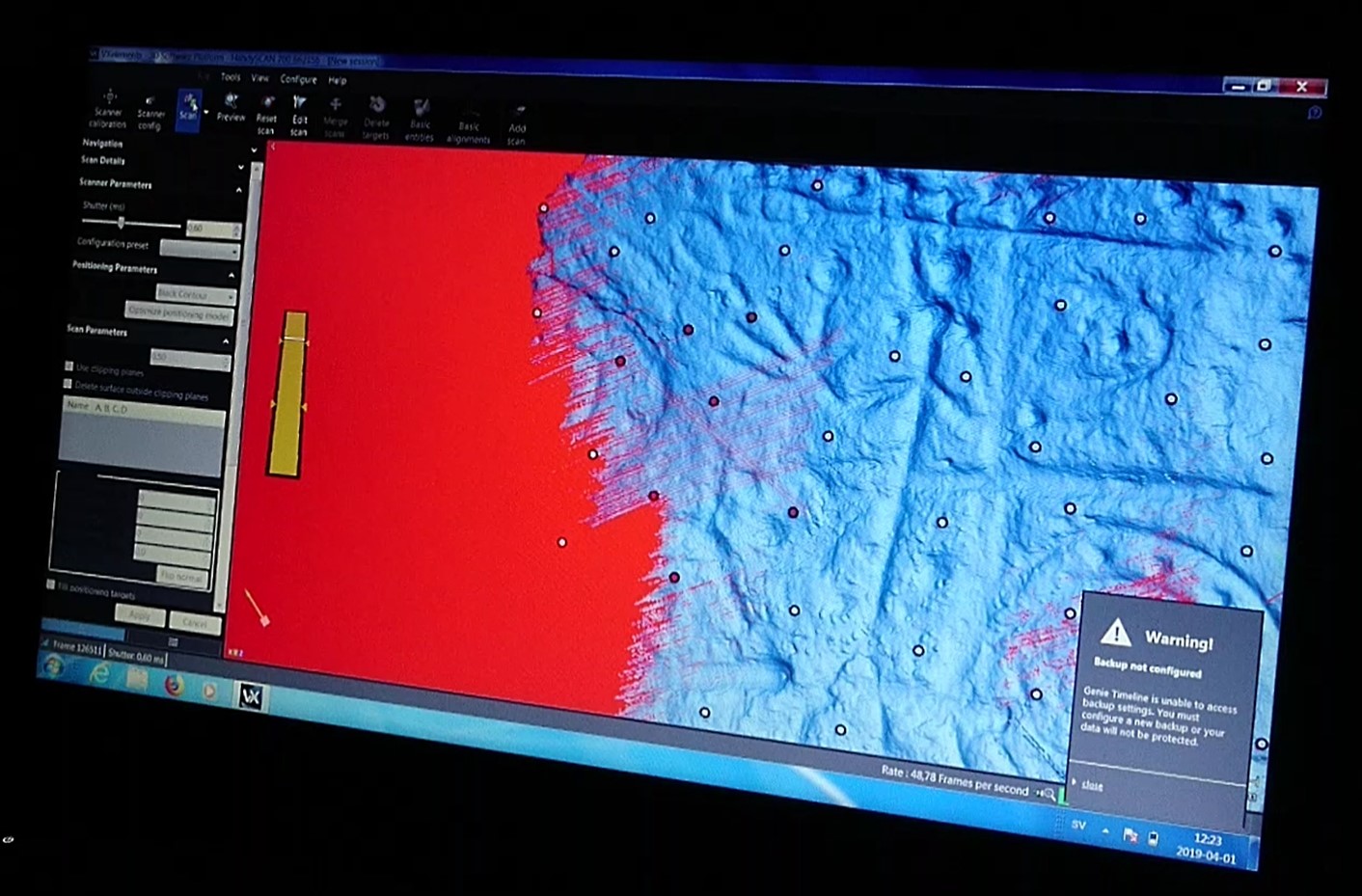 Computer screen showing a terrain model with site distribution points