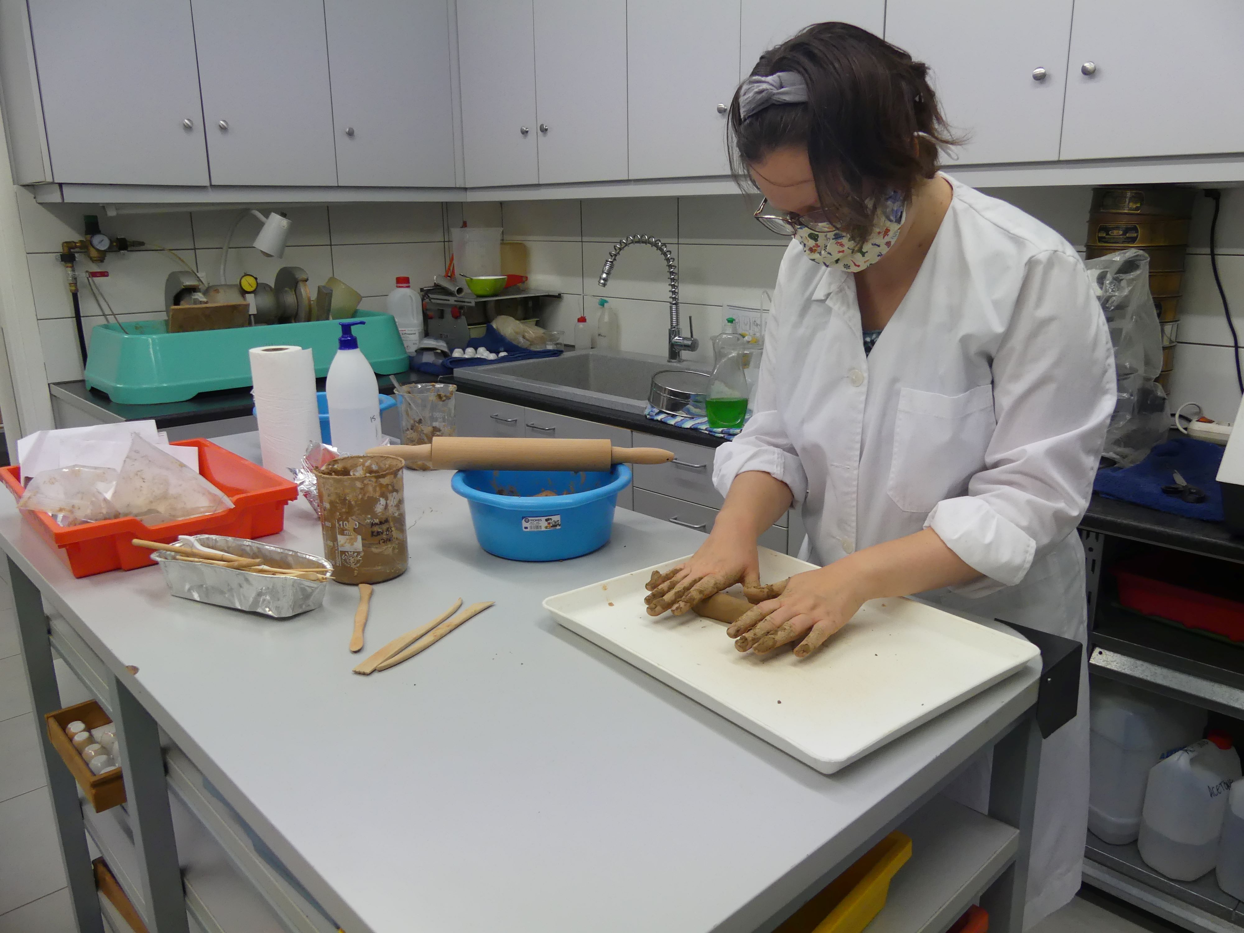 A researcher rolls out a clay tablet. Photo: Evangelia Kiriatzi.