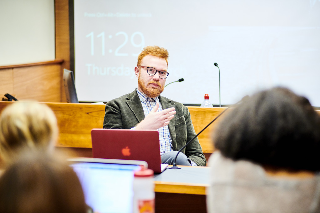 An academic teaching in a lecture hall