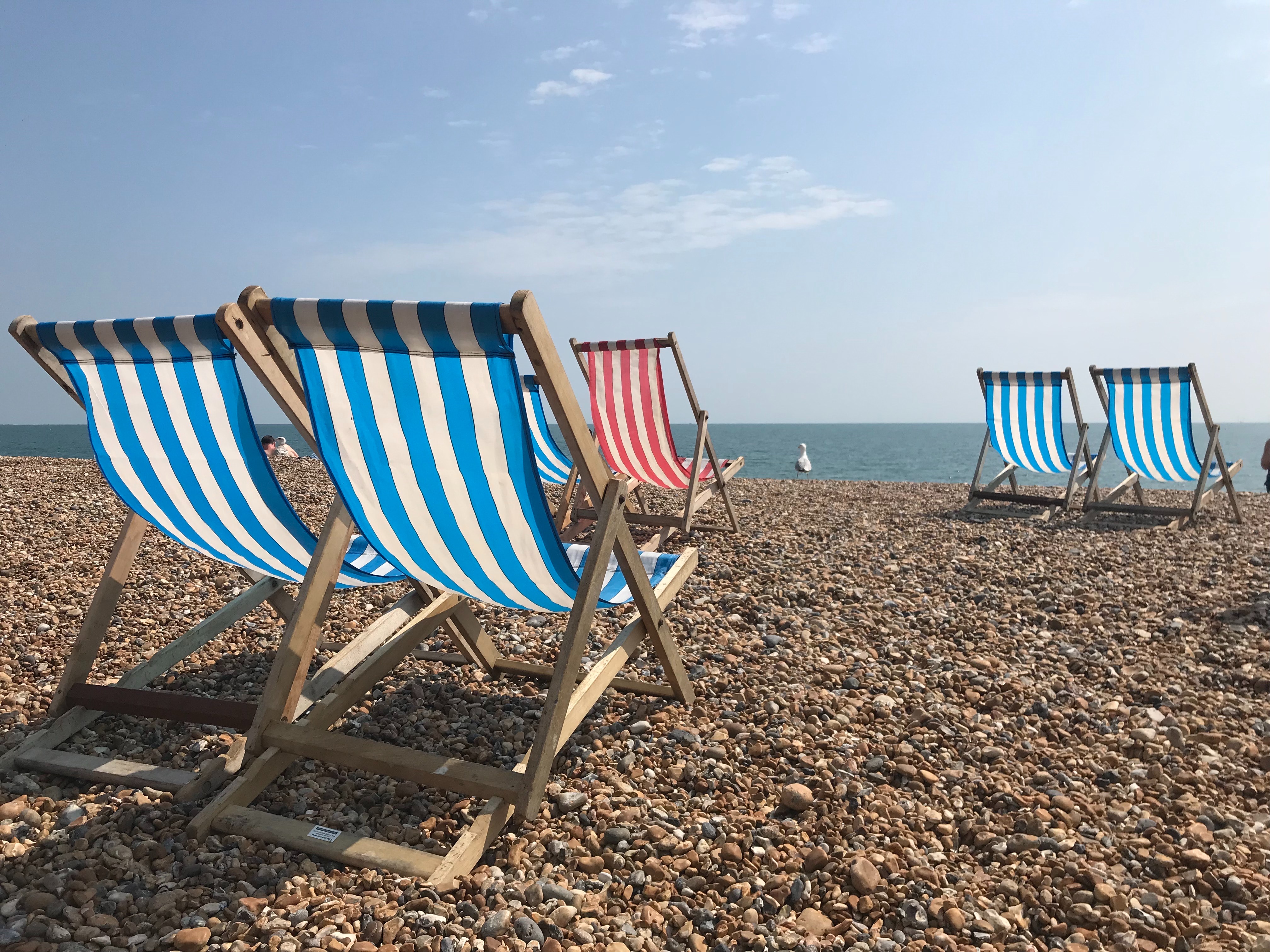 Empty deckchairs on the beach