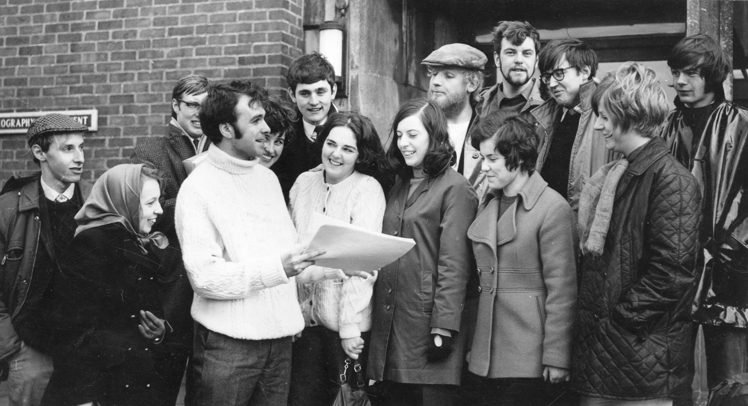 Michael Drury giving instructions in 1970 to students leaving for a field trip in Greece. Image from Linda Drury