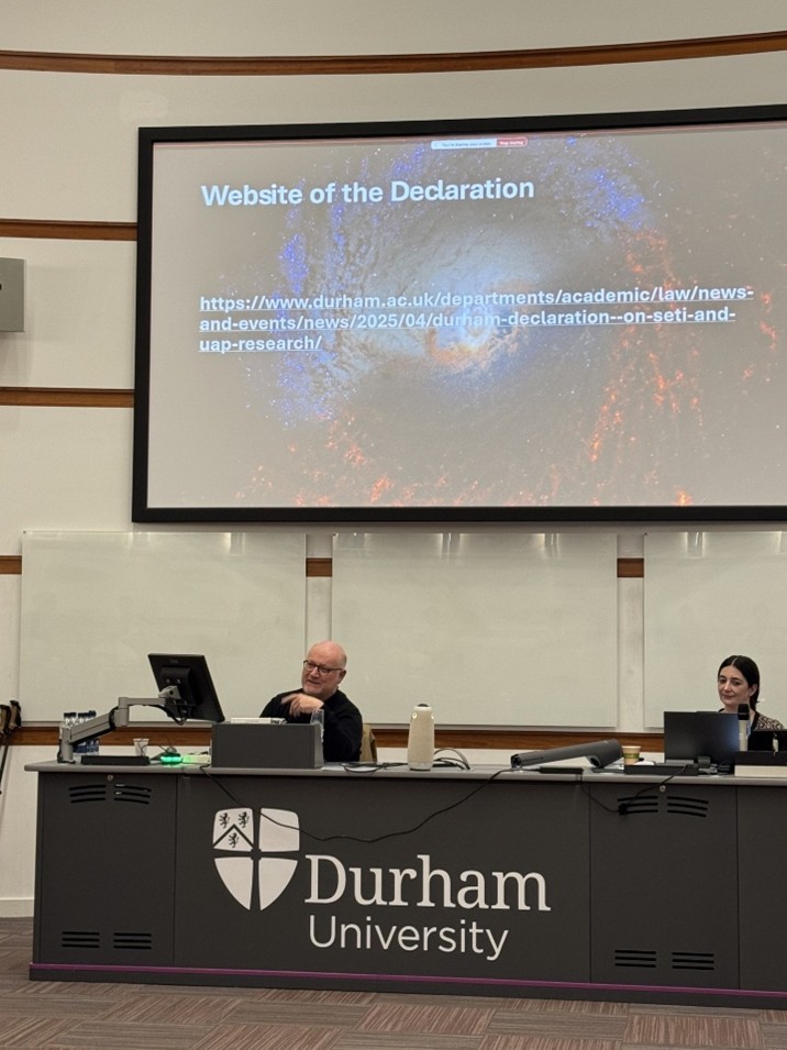 Michael Bohlander in front of a presentation slide