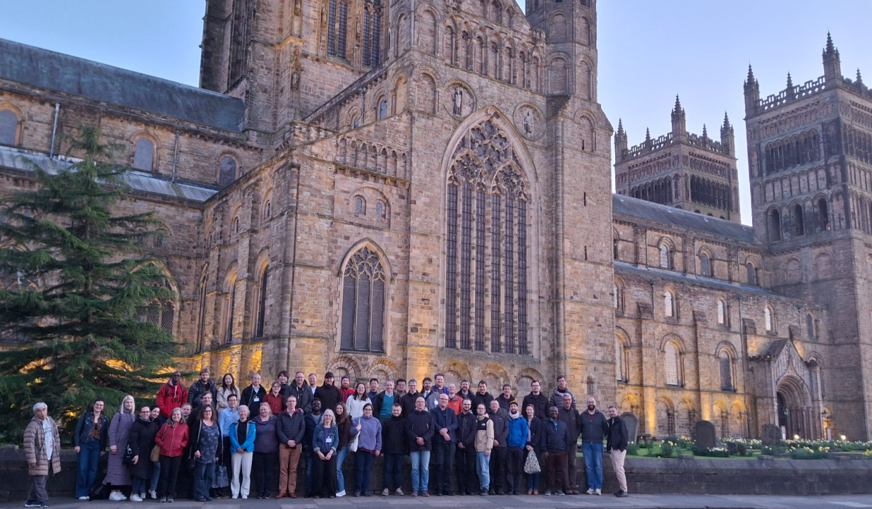 Participants of STACK Conference 2025 stand in front of Cathedral