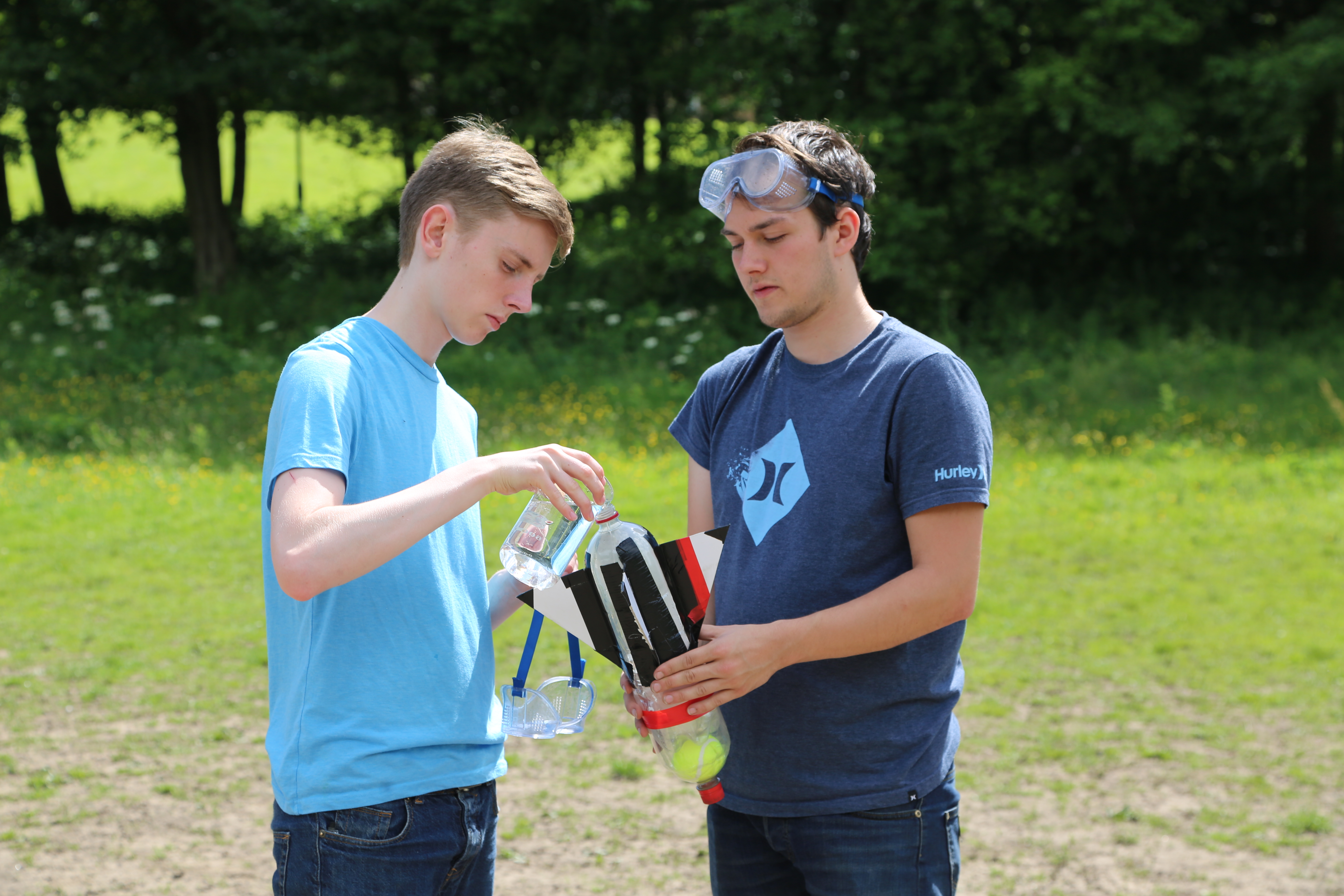 Students making a rocket from bottles