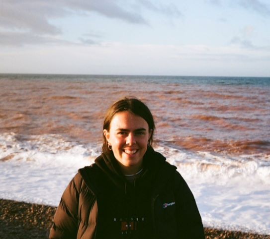 A picture of student Sophie Ewin at the beach