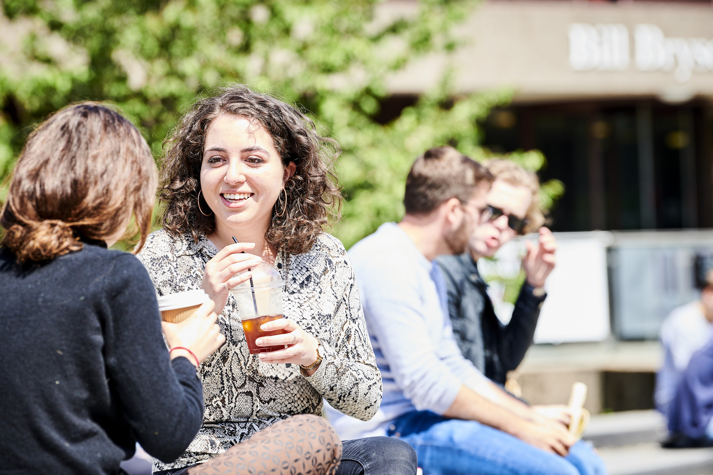 Two students talking on campus