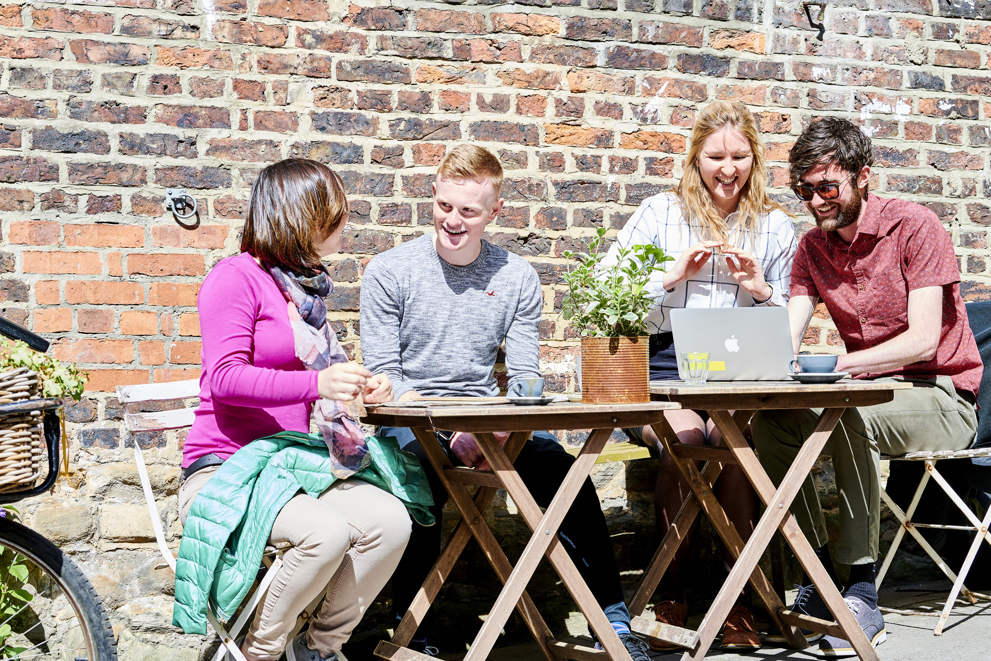 Student group talking at cafe