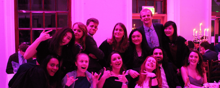 A group of students at a formal dinner