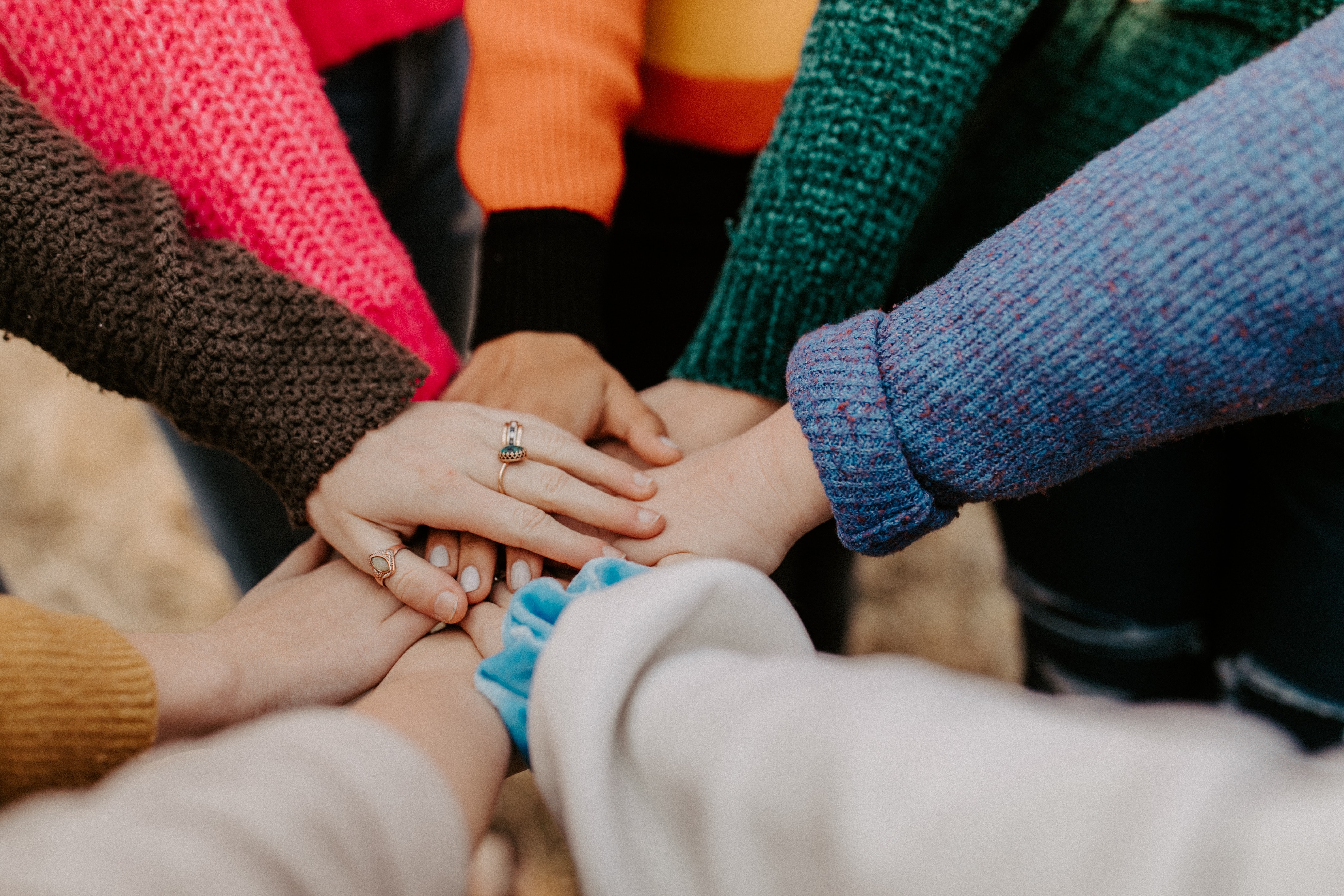 Group of hands in circle