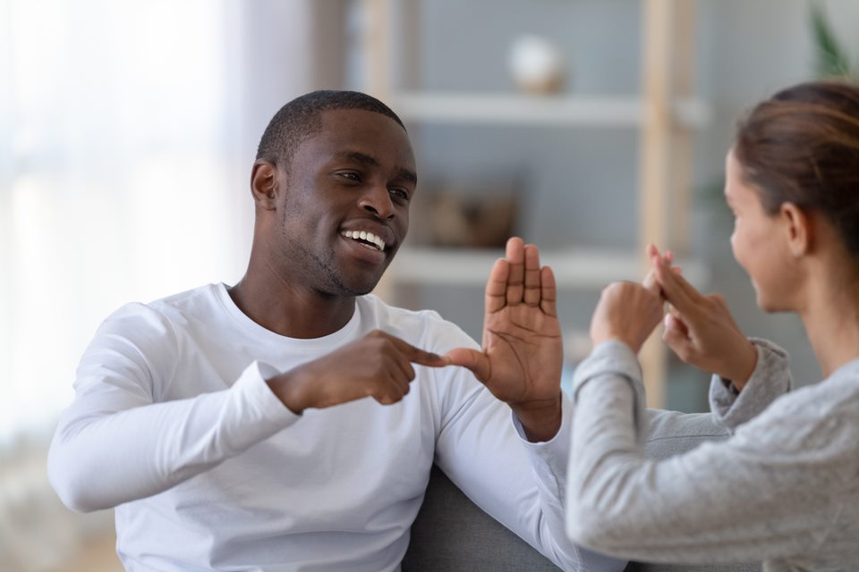 People having a conversation in sign language