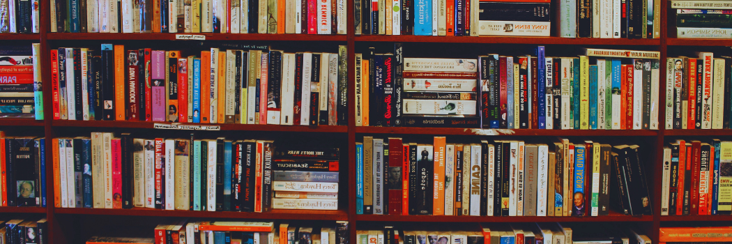 Books lined up on bookshelves