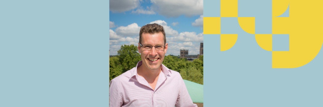 Professor Simon Cornish is pictured against the background of Durham Cathedral in the distance