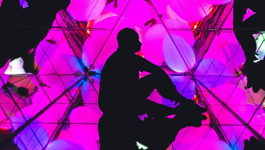A Man inside the teamLab Museum in Fukuoka (TeamLab Forest)