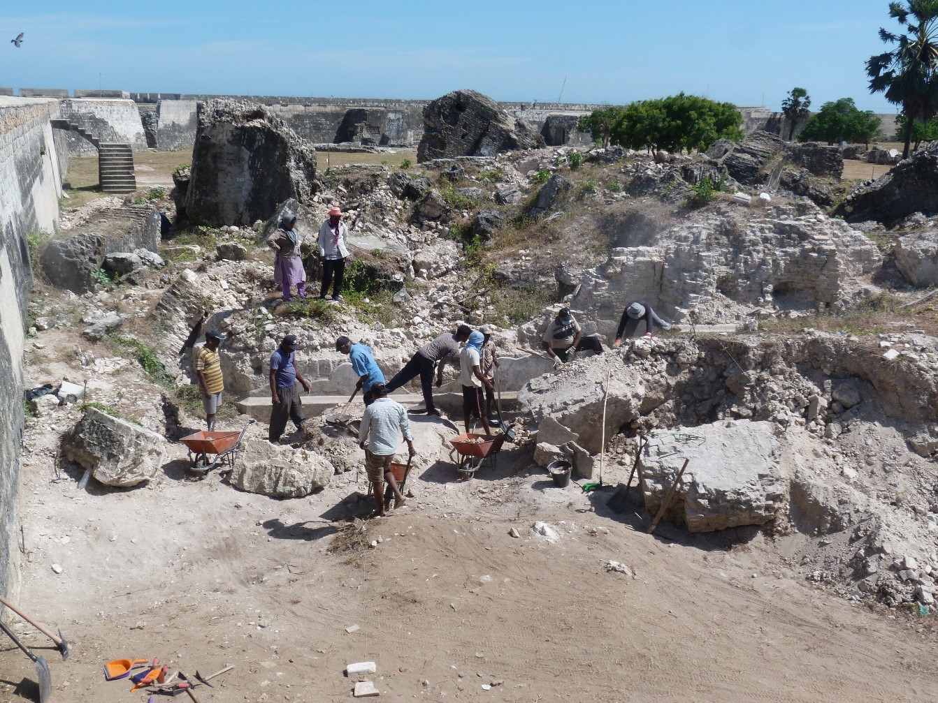 Clearing away the rubble and debris from the destroyed Kruys Kurk in Jaffna