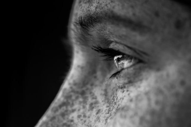 Photo of the eyes of a man looking off to the side