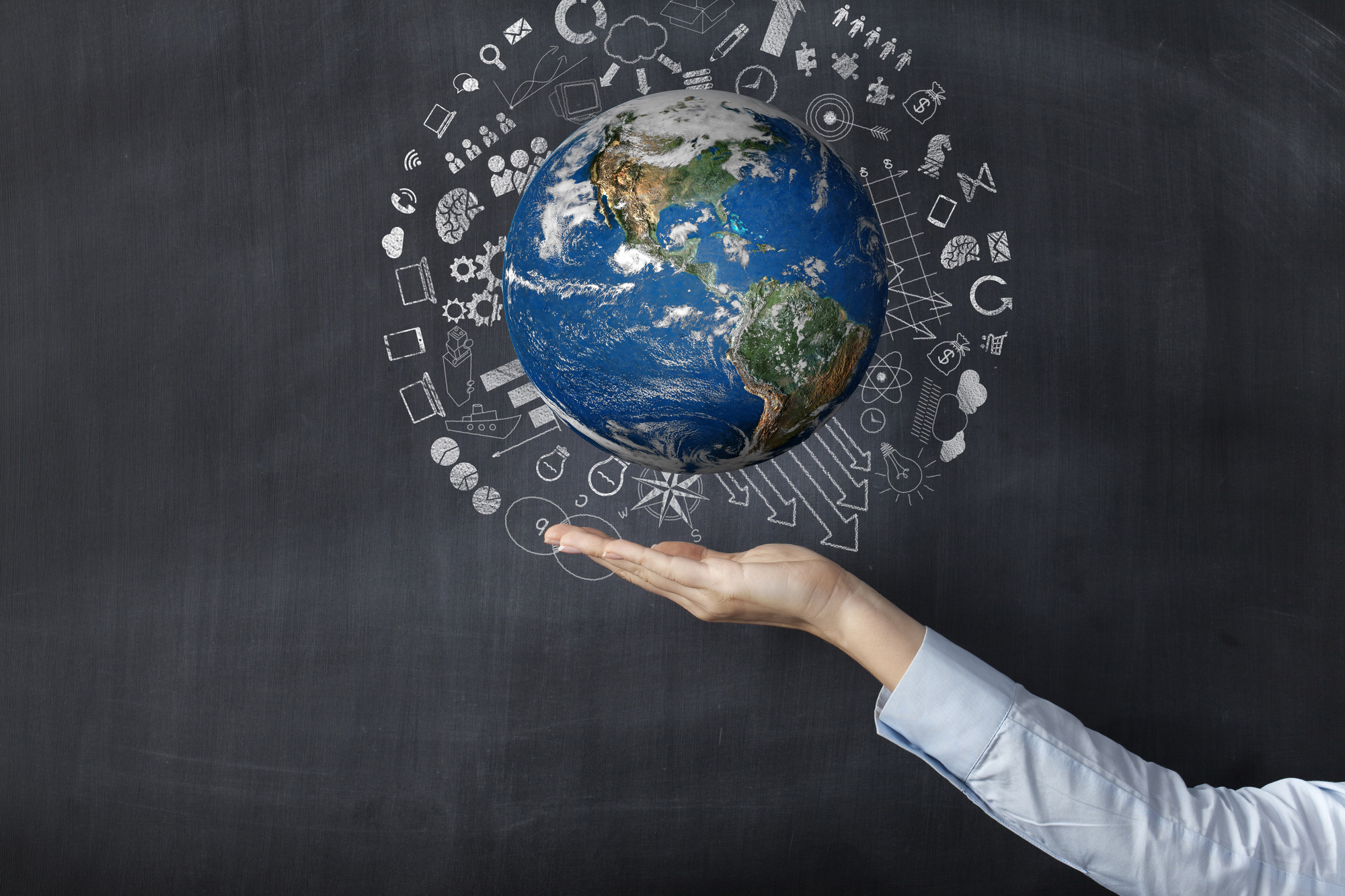 Hand holding Globe