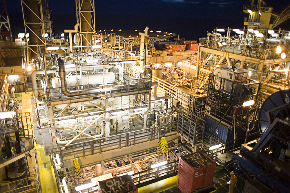 An oil rig platform at night