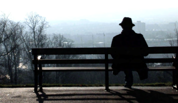 a person sitting on a bench