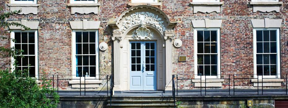 External shot of the front door leading into the institute of advanced study