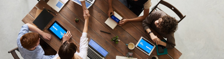 A group of business people around a table