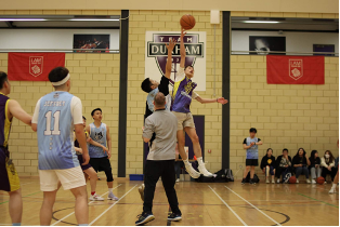 Students playing basketball