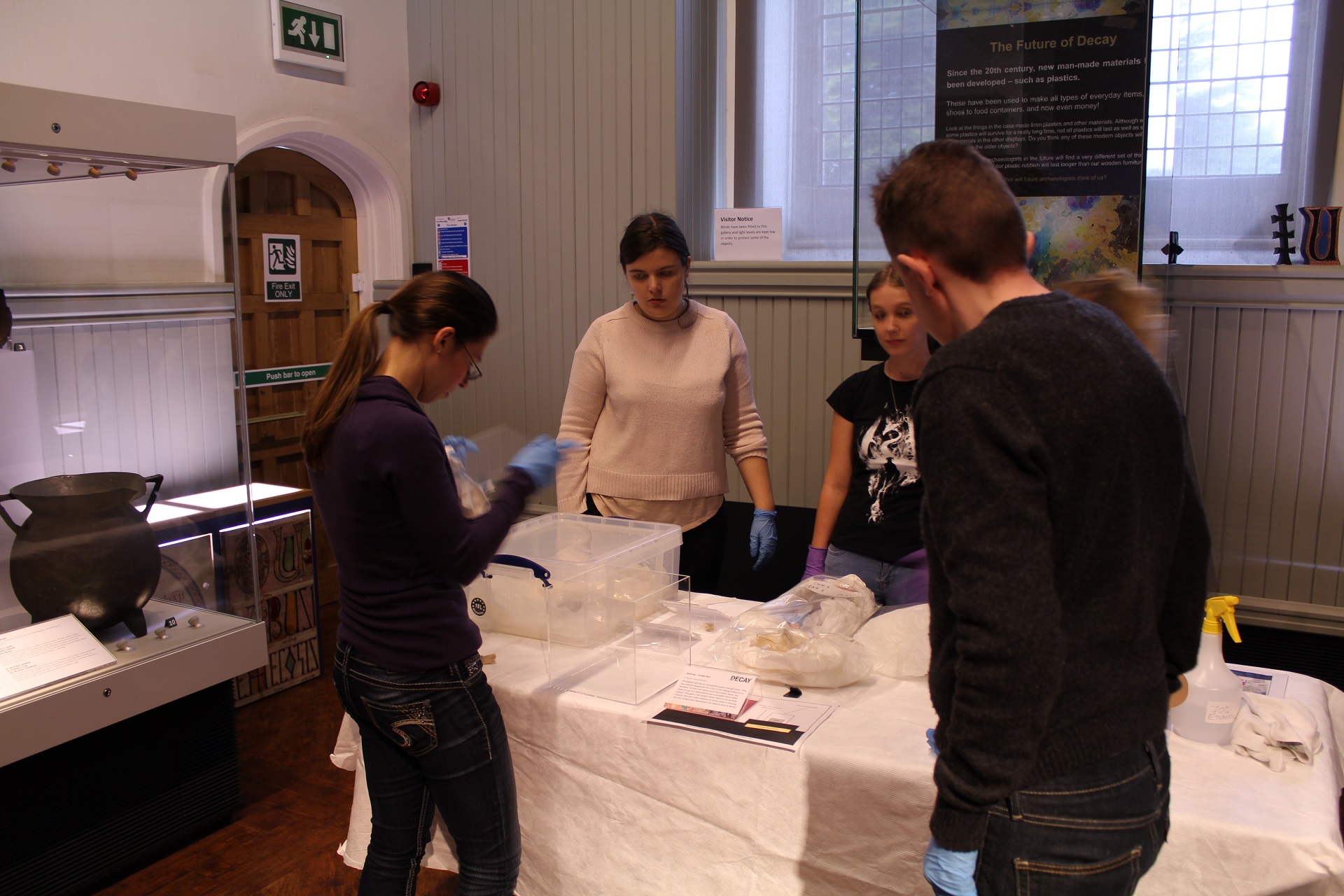 Students installing the Decay exhibition.